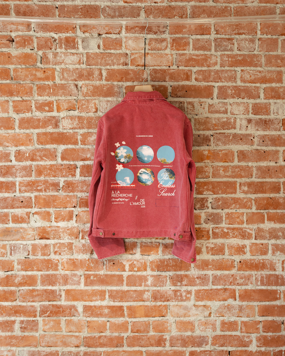 S'envoler Searching For Love red collared denim jacket, back view.