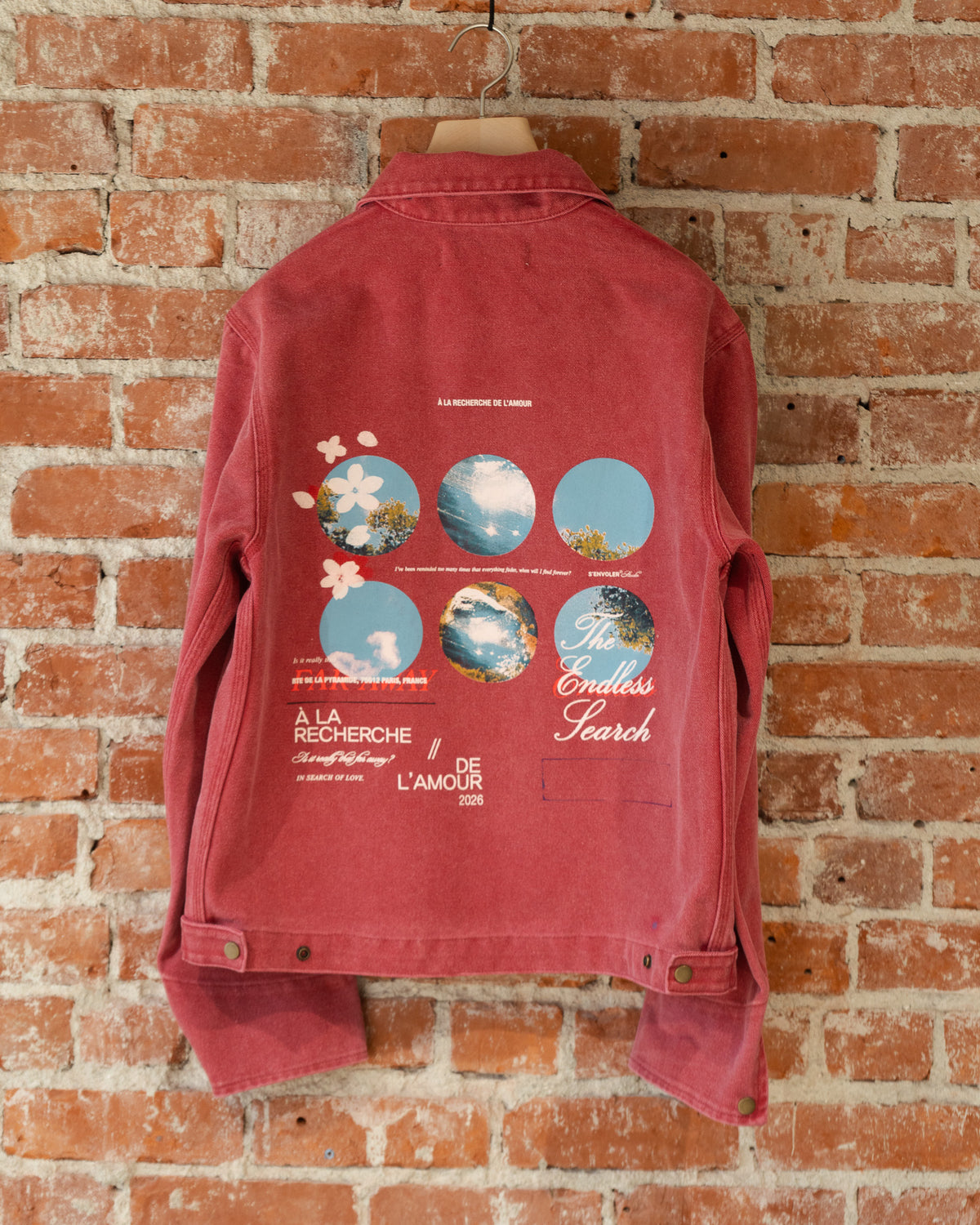 S'envoler Searching For Love red collared denim jacket, closeup back view.