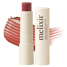Melixir vegan lip butter with packaging on a white background