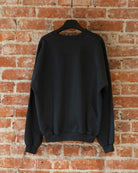 Smile Crewneck in Charcoal, closeup back view.