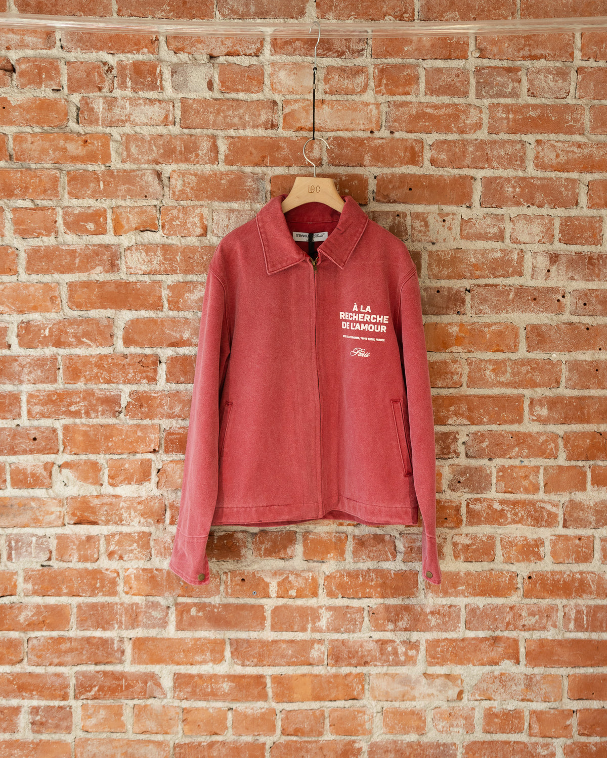 S'envoler Searching For Love red collared denim jacket, front view.