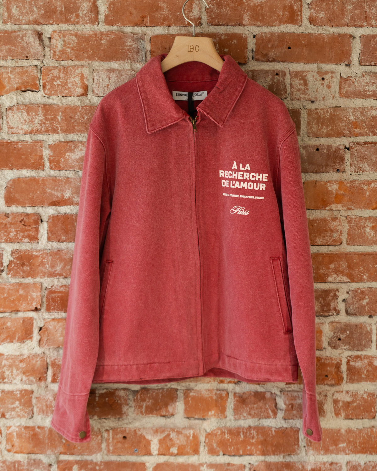 S'envoler Searching For Love red collared denim jacket, closeup front view.