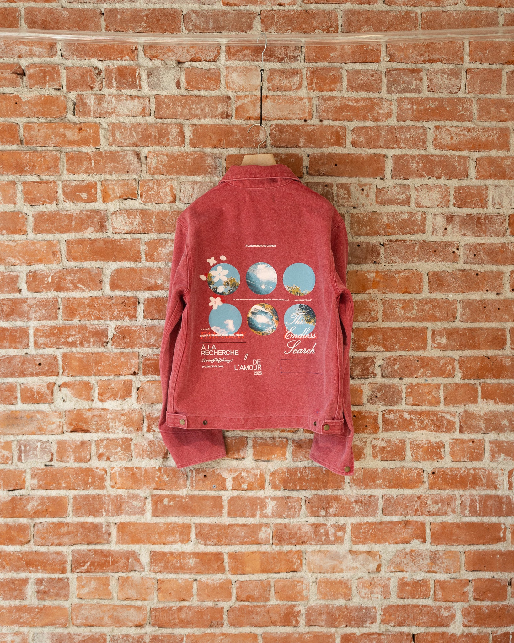 S'envoler Searching For Love red collared denim jacket, back view.